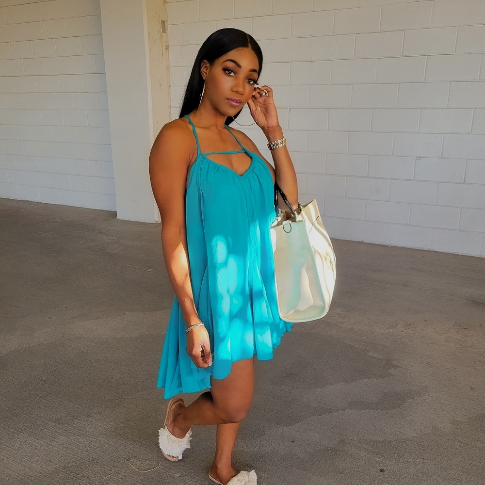 Flowy mini dress.   ( Belt sold separately)